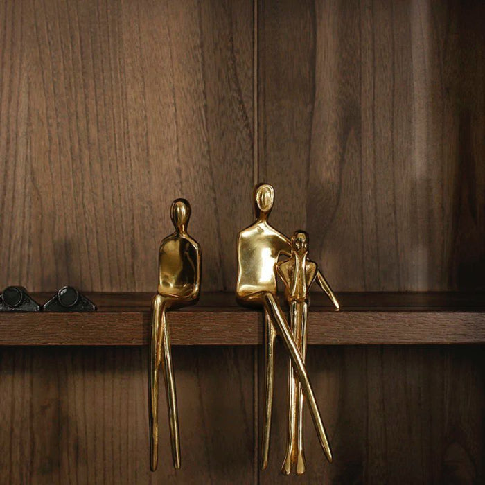 Statuetă decorativă metal auriu lucios, design abstract siluetă umană